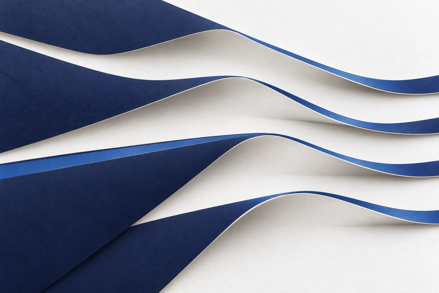Broad folded paper paths share one composition, representing connected operating domains.
